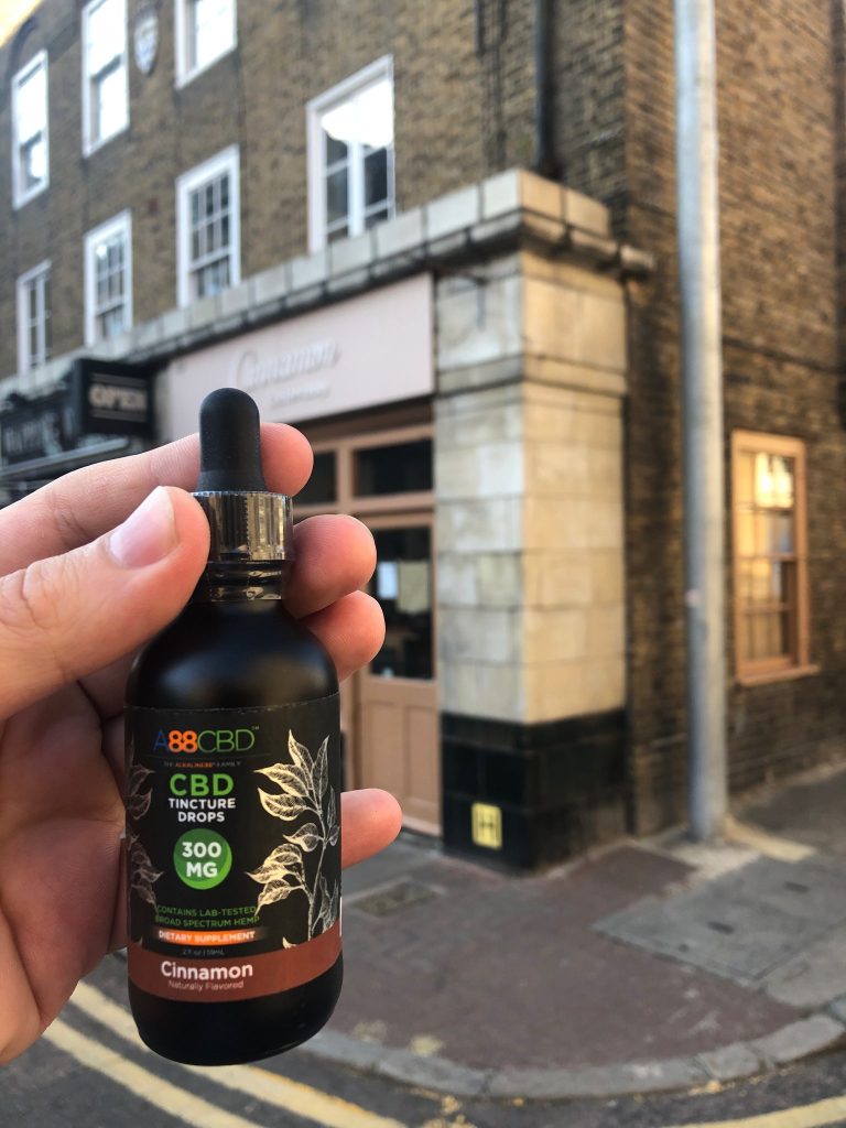 Cinnamon Flavoured CBD TIncture next to my favourite Cinnamon Cafe in Wapping! P.S. They serve very tasty avocado and aubergine carrot cake.